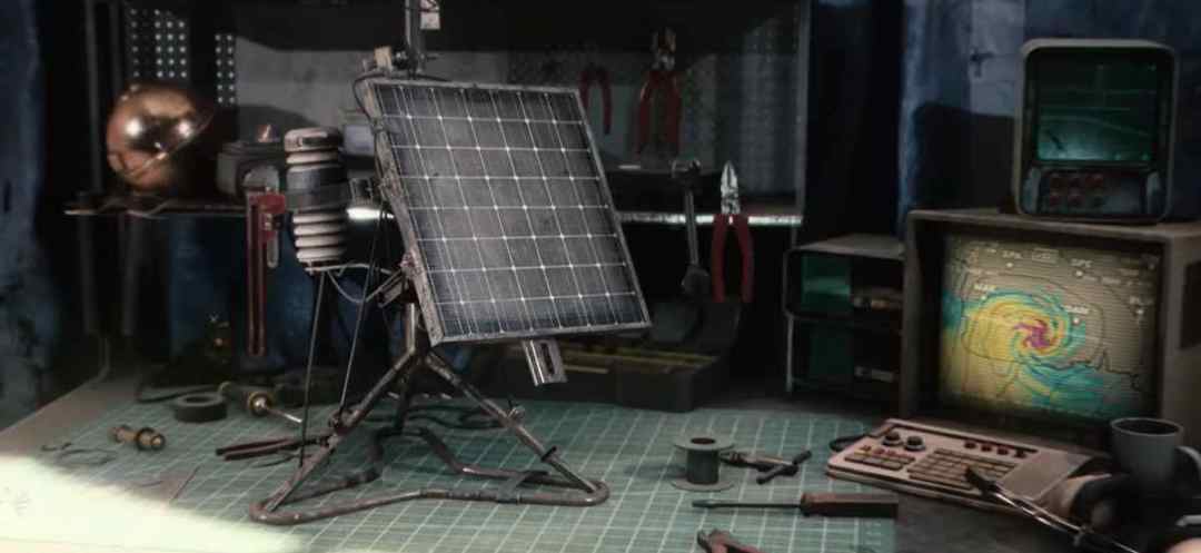 The Weather Monitoring System project workbench in Speranza, showing a solar panel device next to a hurricane radar display